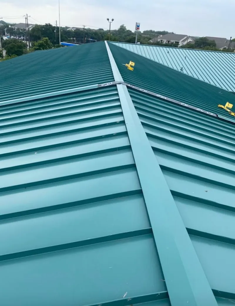 Green commercial metal roof ridge and valley for Metal Roof Repair in Groveland
